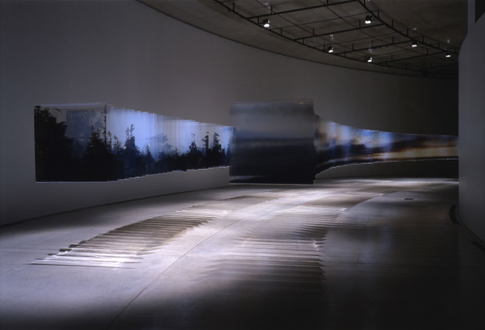 Installation view of countless acrylic panels.