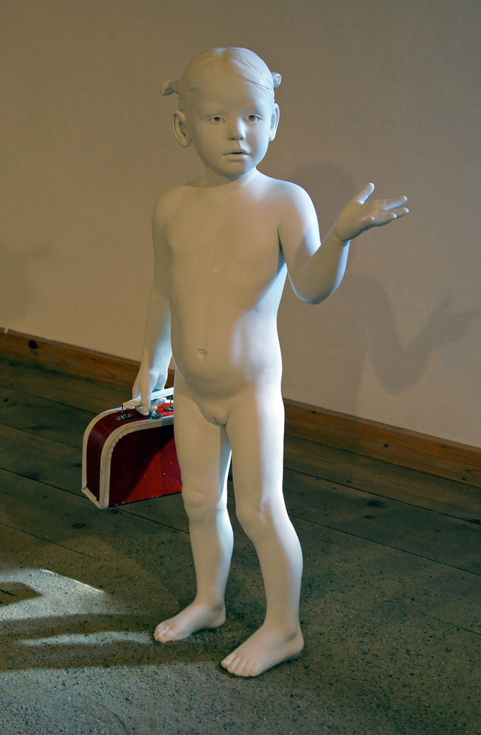 Little girl with suitcase, another beautiful ceramic sculptured crafted by May Von Krogh.