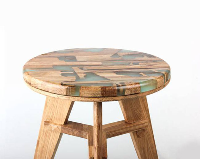 Close up of the wood stool by Hattern.