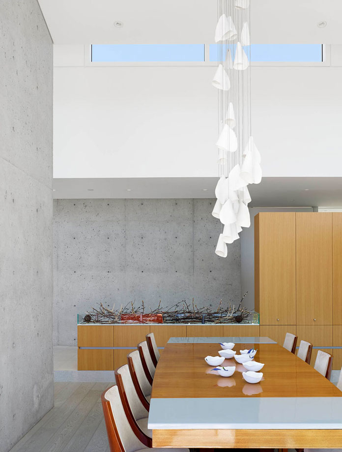 Dining area with extraordinary pendant.