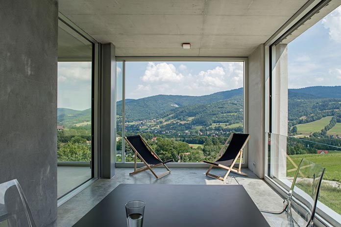The house provides great views of the hilly landscape.