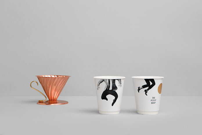Printed coffee mugs.