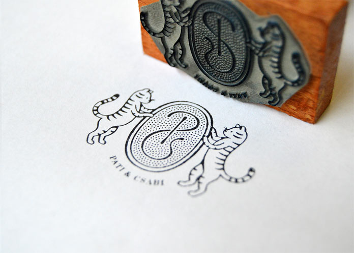 Stamp for Pati and Csabi, a young engaged couple with two cats.