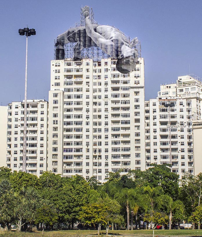 Giant athlete installation in Rio de Janeiro by French artist JR.