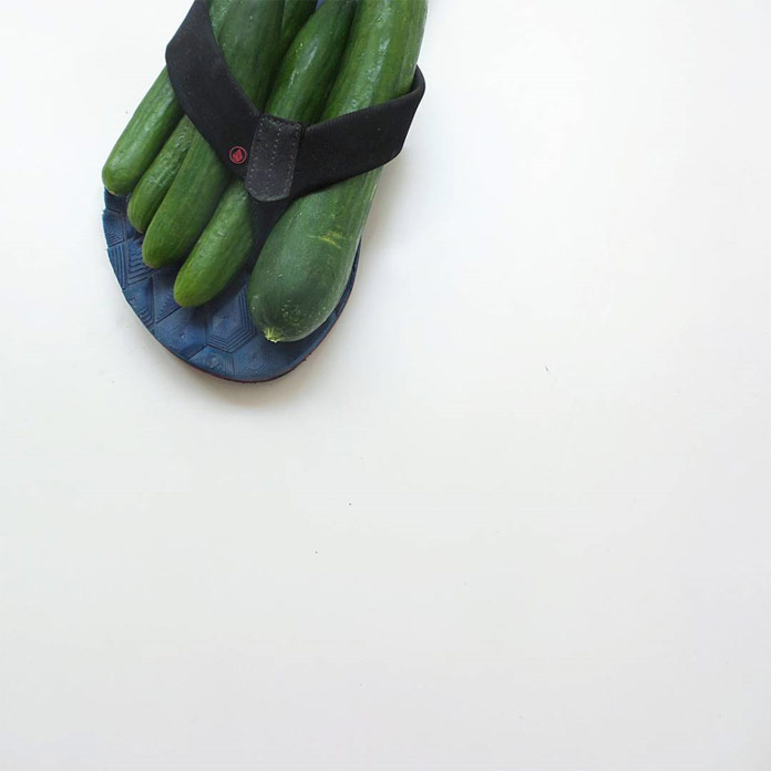 Cucumber feet in flip flops.