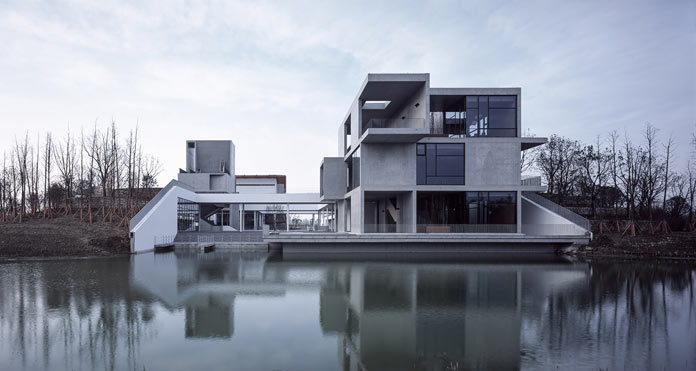 View from the water towards the Intangible Cultural Heritage Museum in China by Vector Architects.