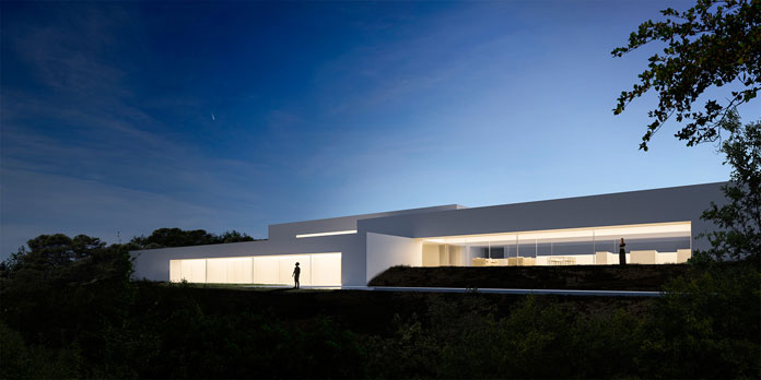 Casa Zarid by Fran Silvestre Arquitectos, View of the house after sunset.