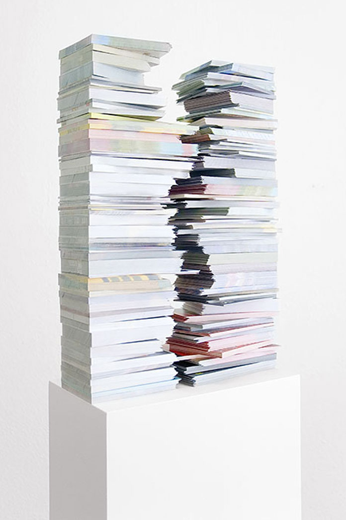 Gemis Luciani, External Definition - cutted flyers on plinth