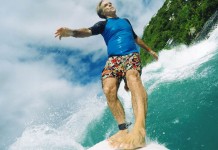 David Carson on his surfboard.