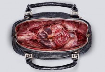 Crocodile leather bag with a heart, muscles and bowels inside in a Bangkok pop-up store.
