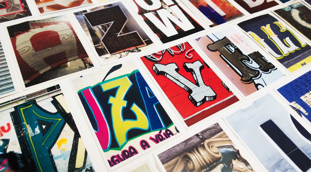 Typographic postcards that compare New York City and São Paulo.