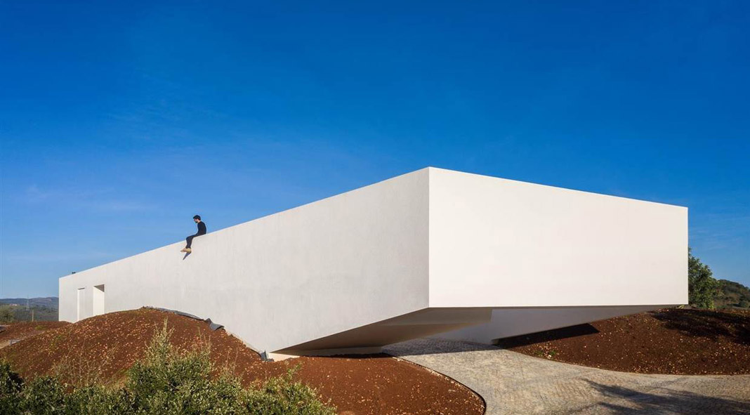 House in São Bartolomeu de Messines, Portugal by Vitor Vilhena Architects.