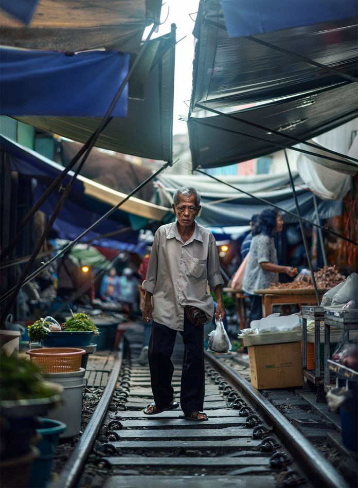 The Maeklong railway market in Bangkok photographed by Ashraful Arefin.