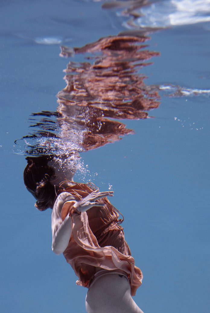 Elegant underwater photography by Marta Syrko.