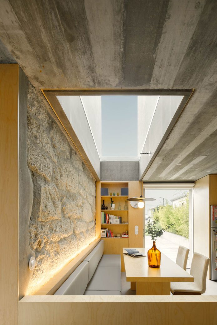 Three old houses converted into one by Paulo Merlini Architects.