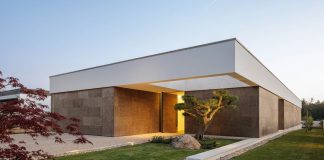 Architect Mário Alves brings forth Casa AS, a house dressed in cork features a canopy that represents the horizon