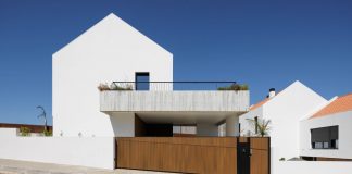 Minimalist houses rising as part of the landscap