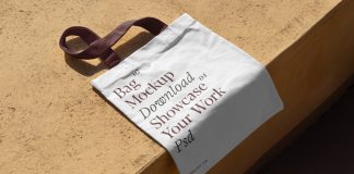 PSD mockup of a canvas bag lying on the edge of the floor.