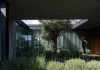 Casa da Encosta: The Architectural Marvel That Built Its Own World Casa da Encosta, a project by Ricardo Azevedo Arquitecto, photographed by Ivo Tavares