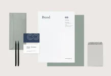 Adobe Photoshop corporate identity mockup with a customizable stationery set and business card.